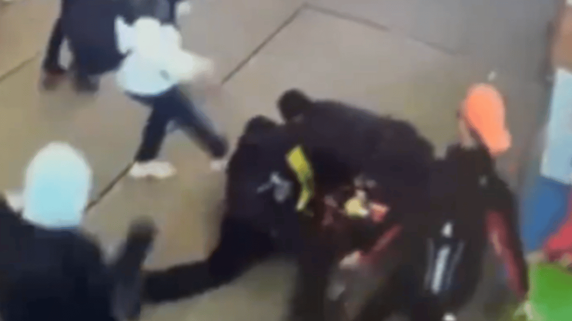 A group of illegal immigrants were seen attacking two NYPD officers outside a migrant shelter in Times Square, New York City.