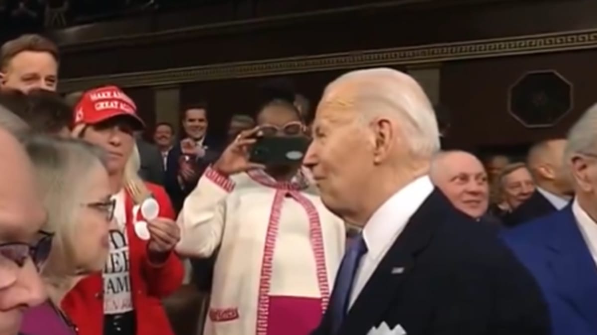 Marjorie Taylor Greene twice pressured President Biden at the State of the Union speech to say the name of Laken Riley.