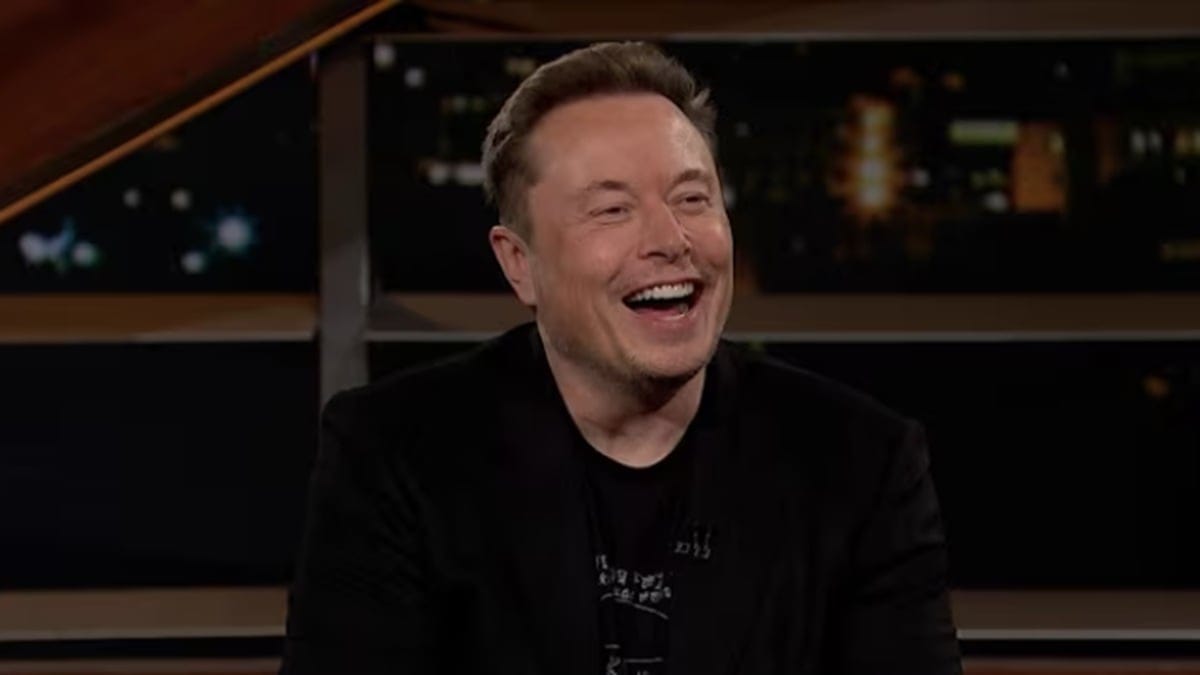 Elon Musk laughing