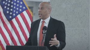 Senator Cory Booker initially celebrated a group of pro-Palestinian protesters interrupting a speech before attempting to drown them out with his own awkward effort.