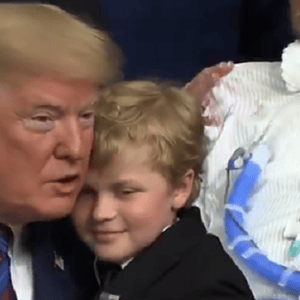Trump hugs child