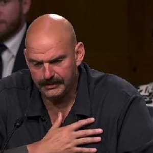 Senator John Fetterman fought through tears while discussing being bullied during a committee hearing Thursday.