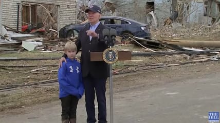 President Biden was greeted with 'Let's Go Brandon' jeers as he arrived in Kentucky to survey the damage left behind by deadly tornadoes this past weekend.