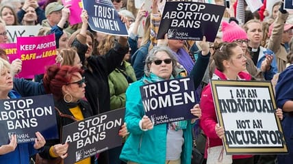 woke capital abortion