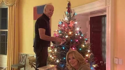 Photo of Joe Biden Climbing a Ladder to Decorate a Christmas Tree Has People Nervous