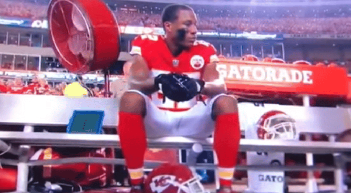 marcus peters sits national anthem