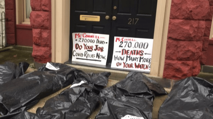 An activist group demanding a COVID relief package piled-up body bags in front of the homes of several Republican lawmakers Tuesday morning.