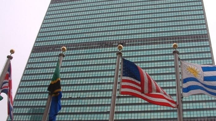 un costs us