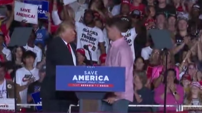 Lance Corporal Hunter Clark, a Marine who appeared on stage at a rally for former President Donald Trump, is now under investigation.