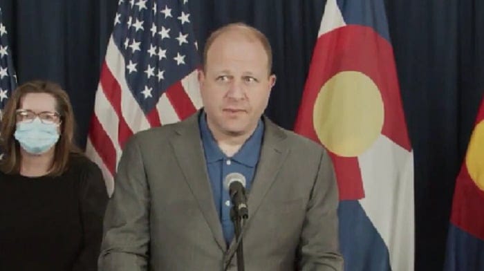 Colorado Governor Jared Polis - a Democrat - says he will not implement any new mask mandate in his state in response to the mild omicron variant, declaring the COVID emergency "over."