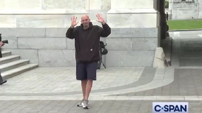 Senator John Fetterman made his triumphant return to the Senate Monday sporting baggy shorts and an oversized black hoodie sweatshirt.