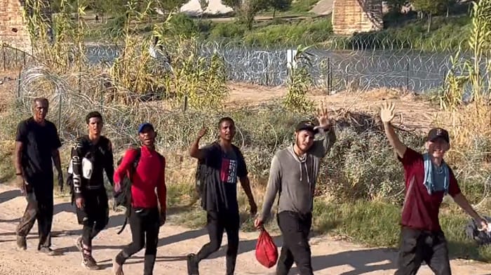 DHS Secretary Alejandro Mayorkas announced that nearly a half-million Venezuelan illegals would be given permission to live and work in the country legally on the same day video surfaced showing thousands marching across the border.