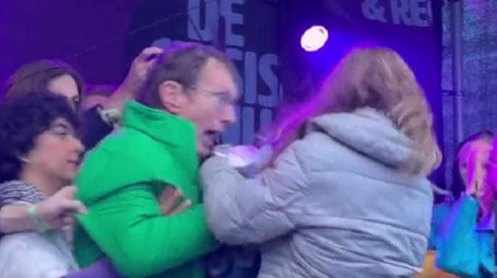 An unidentified man grabbed the microphone away from Greta Thunberg during a climate rally in Amsterdam after the scold invited a Palestinian woman on stage and demanded "freedom" and "climate justice."