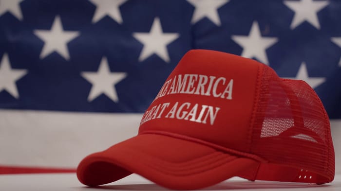 election worker remove MAGA hat