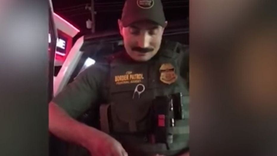 Border agent asks citizen for ID