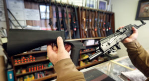 SALT LAKE CITY, UT - OCTOBER 5: A bump stock device, (left) that fits on a semi-automatic rifle to increase the firing speed, making it similar to a fully automatic rifle, is shown next to a AK-47 semi-automatic rifle, (right) at a gun store on October 5, 2017 in Salt Lake City, Utah. Congress is talking about banning this device after it was reported to of been used in the Las Vegas shootings on October 1, 2017. (Photo by George Frey/Getty Images)
