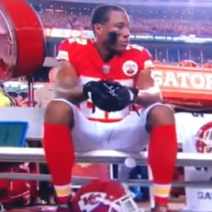marcus peters sits national anthem