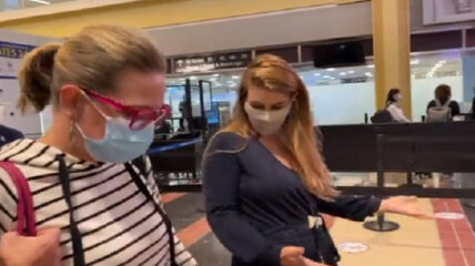Kyrsten Sinema (D-AZ) was again confronted by an activist at an airport, prompting the Senator to demand, "Don't touch me."