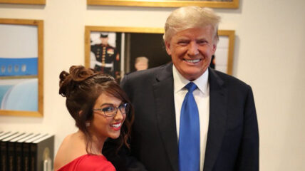 Representative Lauren Boebert taunted AOC with a dress featuring the phrase "Let's Go Brandon" as she met former President Trump at his Mar-a-Lago resort.