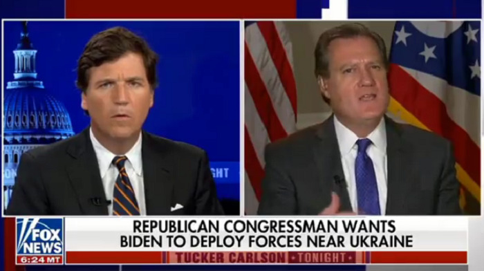 Tucker Carlson got into a heated exchange with Representative Mike Turner, demanding to know why America should send troops to defend Ukraine's border against Russia and not its own southern border.