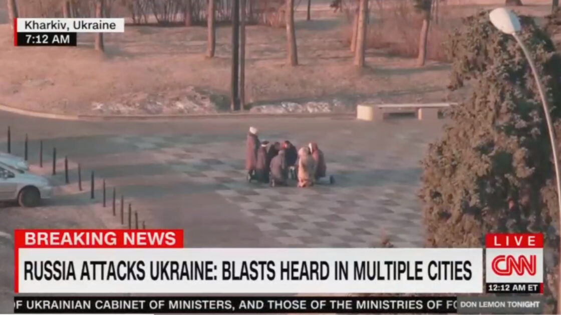 Group Of Ukrainians Kneel And Pray As Russia Bombs Their Country