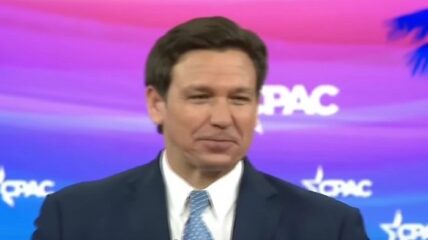 Attendees at CPAC in Florida burst into cheers when Governor Ron DeSantis announced plans to send illegal immigrants to President Joe Biden's home state of Delaware.