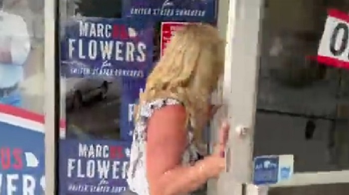 Marjorie Taylor Greene paid a visit to the campaign office of her Democrat opponent Marcus Flowers to wish them "luck," and couldn't help but remark on the place looking empty and messy.