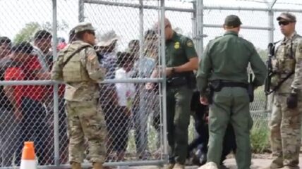 Texas Governor Greg Abbott was furious after seeing video of Border Patrol agents opening a gate at the southern border and allowing dozens of illegal immigrants into the country after Texas National Guard officers had locked it shut.