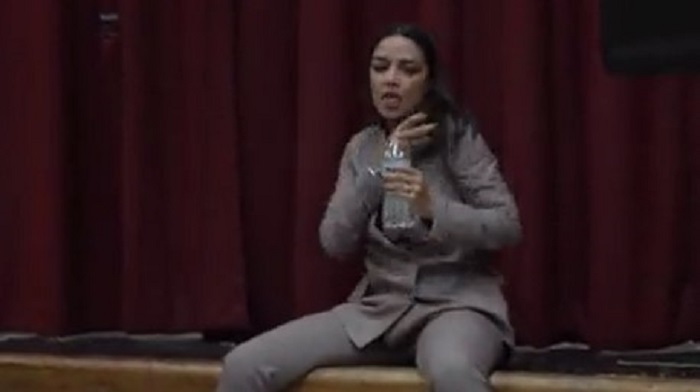 Representative Alexandria Ocasio-Cortez responded rather awkwardly to a group of protesters at her latest town hall, dancing as they chanted "AOC has got to go" and hiding backstage when the lights were turned off.