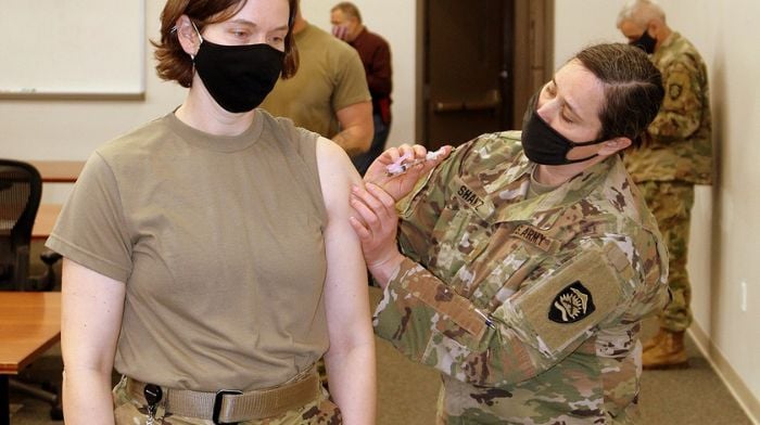 servicemembers discharged covid vaccine