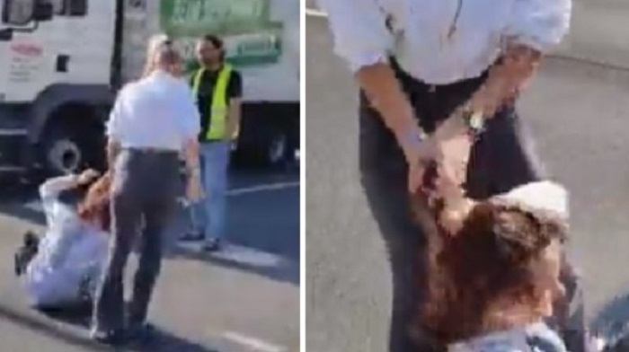 A woman in Germany dragged a climate protester out of the street by her hair after activists attempted to block traffic.