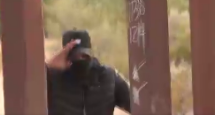 Shocking video captured in Arizona shows numerous illegal immigrants running through a hole in the border wall, aided by a human smuggler, in full view of border patrol agents.