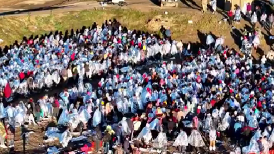 Jaw-dropping videos show a sea of illegal immigrants numbering in the thousands waiting to be 'processed' in Eagle Pass, Texas.