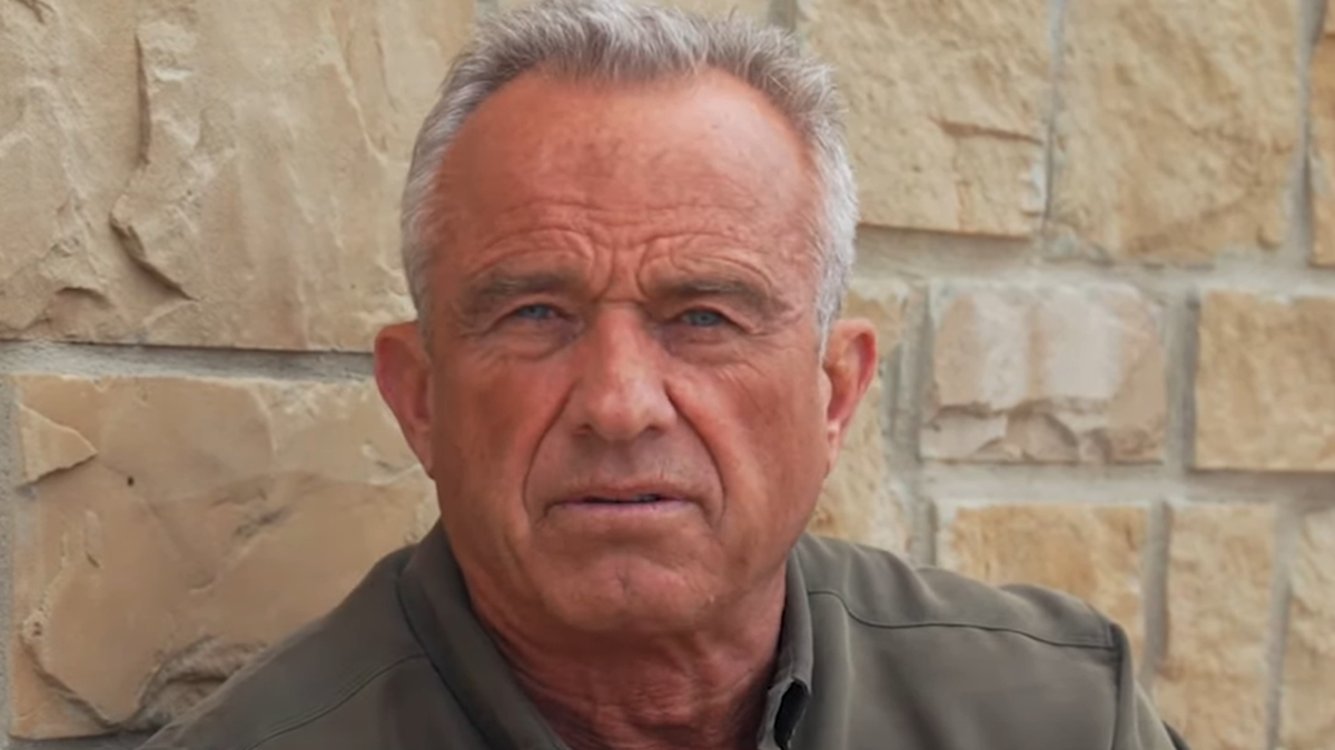Robert F. Kennedy Jr. tells CNN that Biden poses a bigger threat to democracy than Trump without a doubt.