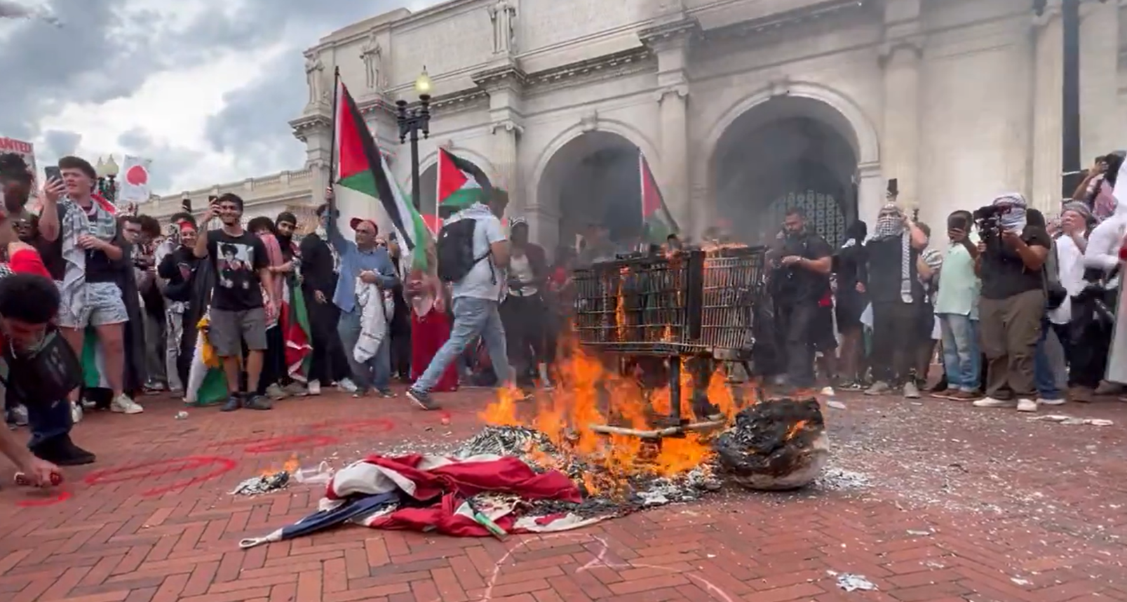 Anti-Israel Protesters Tear Down US Flags, Burn Them, Raise Palestinian Flags Blocks From Capitol